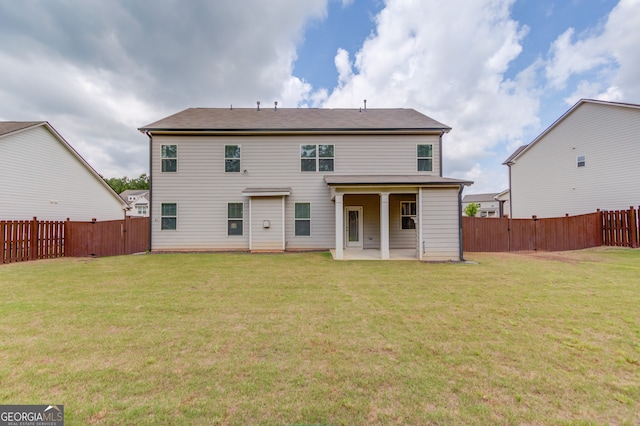 396 Brant Cir, Jefferson, GA 30549 - back of property featuring a patio and a fenced backyard