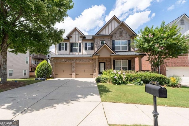 812 Autry Oak Ct, Alpharetta, GA 30022 - view of front of property featuring board and batten siding, brick siding, driveway, a garage, and a front yard