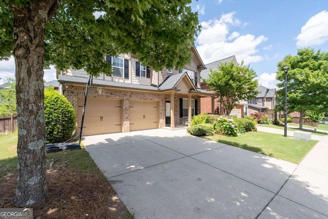 812 Autry Oak Ct, Alpharetta, GA 30022 - view of front of house featuring brick siding, driveway, a garage, and a front yard