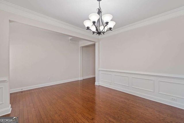 812 Autry Oak Ct, Alpharetta, GA 30022 - empty room with a chandelier, wood finished floors, and crown molding