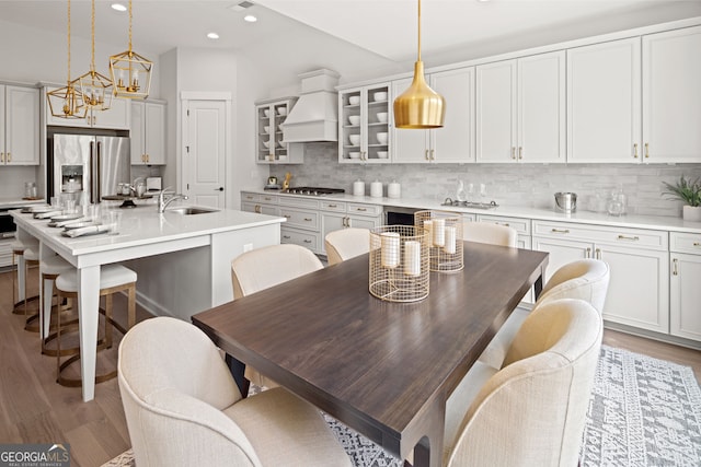608 Southland Pass, Canton, GA 30115 - dining space with wood finished floors, a chandelier, and recessed lighting