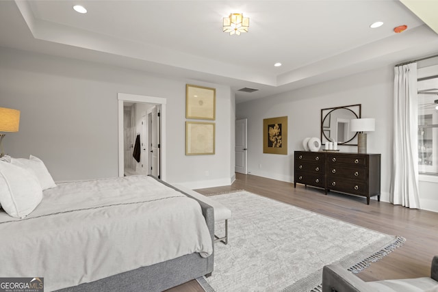 608 Southland Pass, Canton, GA 30115 - bedroom featuring a raised ceiling, wood finished floors, and recessed lighting
