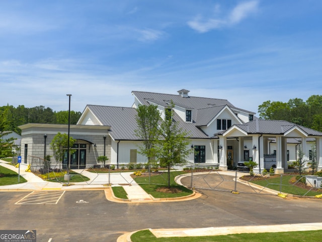 608 Southland Pass, Canton, GA 30115 - view of front of house with a standing seam roof and a metal roof
