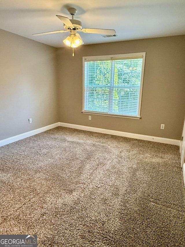 460 Barnett Shoals Rd Unit 5A, Athens, GA 30605 - carpeted spare room with baseboards and a ceiling fan