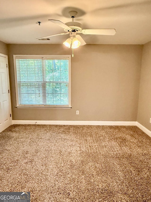 460 Barnett Shoals Rd Unit 5A, Athens, GA 30605 - carpeted empty room with baseboards and ceiling fan