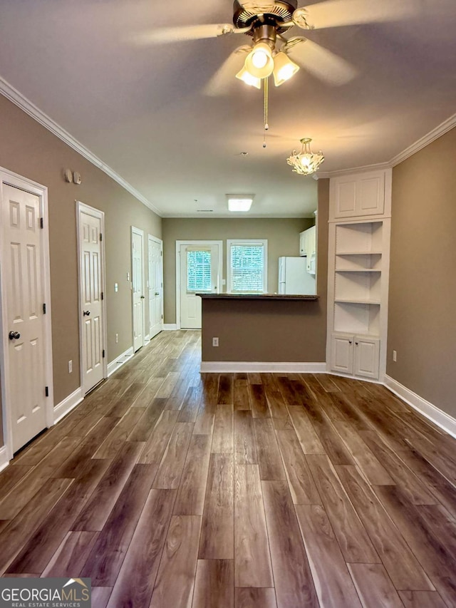 460 Barnett Shoals Rd Unit 5A, Athens, GA 30605 - unfurnished living room featuring dark wood-style flooring, crown molding, and a ceiling fan