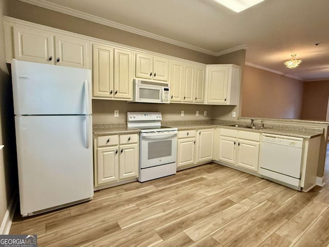 460 Barnett Shoals Rd Unit 5A, Athens, GA 30605 - kitchen with white appliances, ornamental molding, light wood finished floors, a peninsula, and light countertops