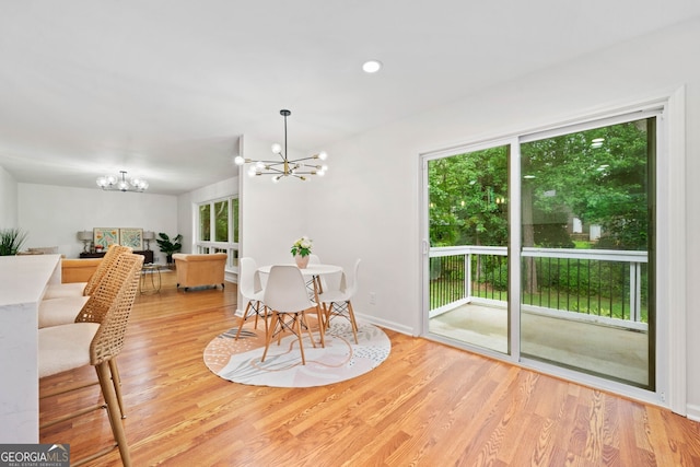 3222 Edgemont Way, Decatur, GA 30032 - dining area featuring a chandelier and light wood-style floors