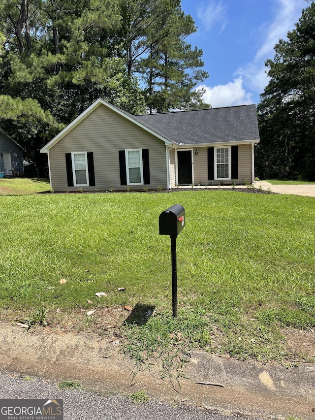 105 Ridgefield Dr, Lagrange, GA 30241 - single story home featuring a front lawn and roof with shingles
