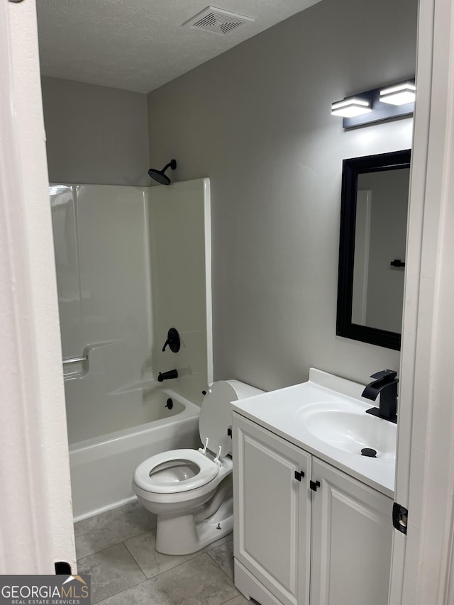 105 Ridgefield Dr, Lagrange, GA 30241 - full bathroom with vanity,  shower combination, and a textured ceiling