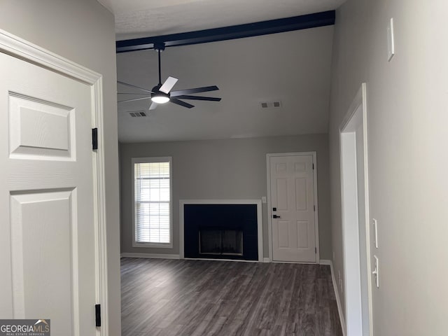 105 Ridgefield Dr, Lagrange, GA 30241 - unfurnished living room featuring ceiling fan, dark wood-style flooring, high vaulted ceiling, a fireplace, and beamed ceiling