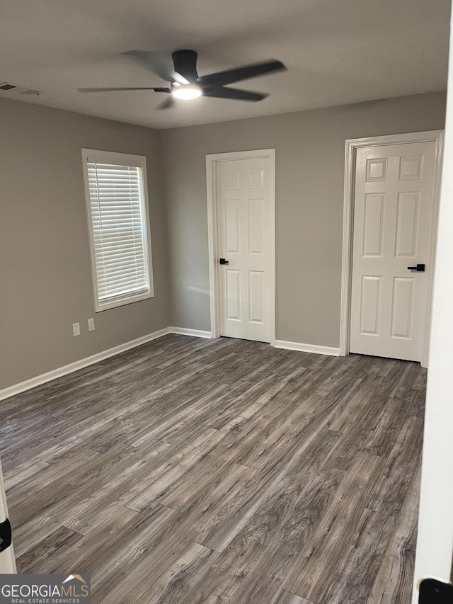 105 Ridgefield Dr, Lagrange, GA 30241 - unfurnished bedroom with dark wood-type flooring and a ceiling fan