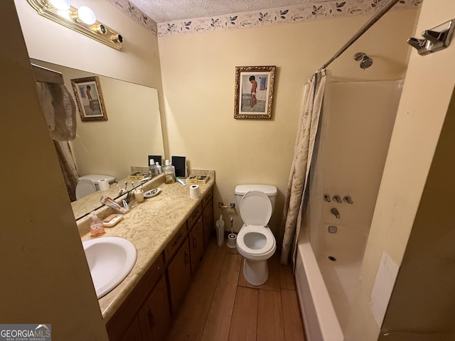 6884 Red Maple Ct, Rex, GA 30273 - full bathroom with vanity, shower / bath combination with curtain, wood finished floors, and a textured ceiling