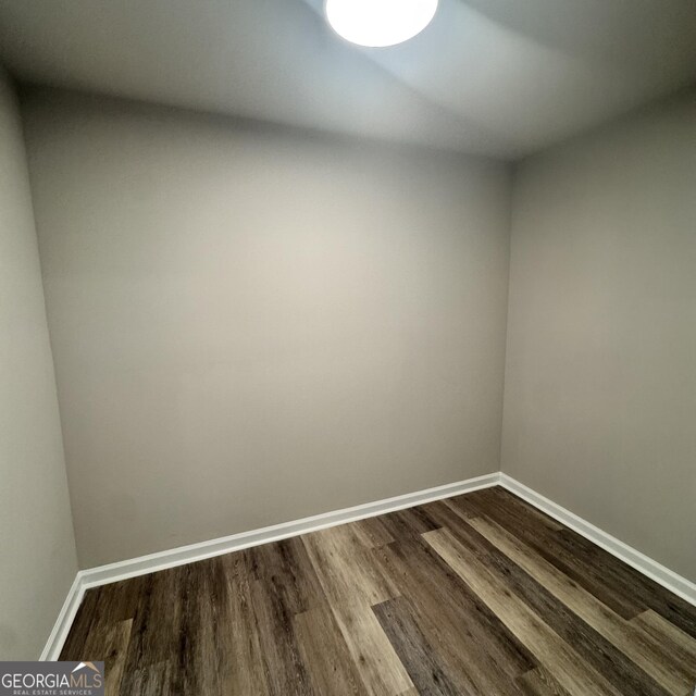 1425 Walls Ln, Macon, GA 31211 - spare room featuring dark wood finished floors