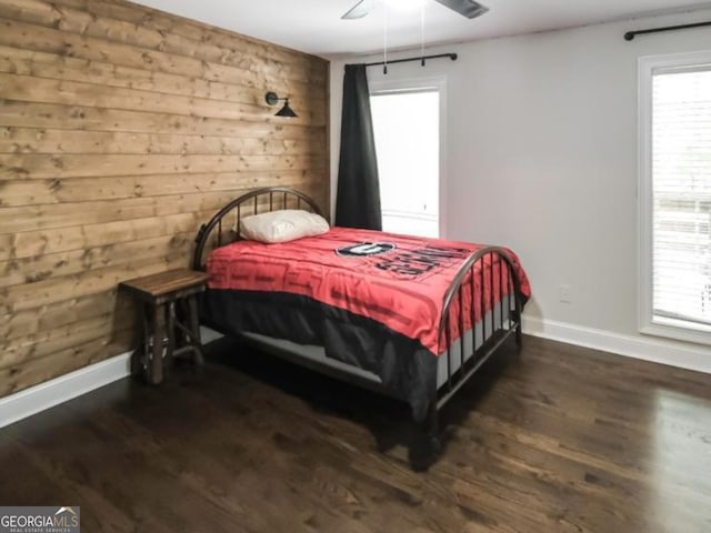 180 Mountain Path, Rockmart, GA 30153 - bedroom with wood finished floors, wooden walls, and ceiling fan