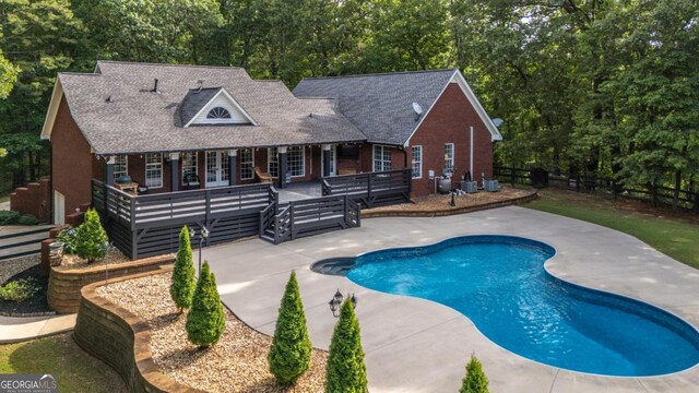 180 Mountain Path, Rockmart, GA 30153 - swimming pool featuring a patio, a wooden deck, and french doors