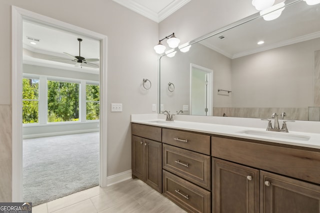 183 Ryan Nicholas Dr, Kingsland, GA 31548 - bathroom featuring double vanity, crown molding, ceiling fan, tile patterned floors, and recessed lighting