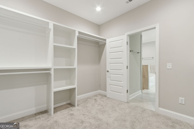 183 Ryan Nicholas Dr, Kingsland, GA 31548 - spacious closet featuring carpet floors