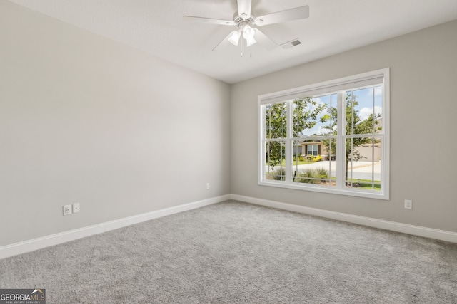183 Ryan Nicholas Dr, Kingsland, GA 31548 - spare room featuring a ceiling fan and carpet floors