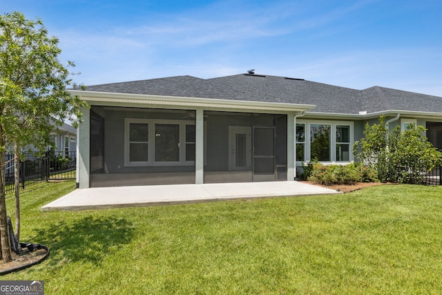 183 Ryan Nicholas Dr, Kingsland, GA 31548 - rear view of house with a sunroom and roof with shingles