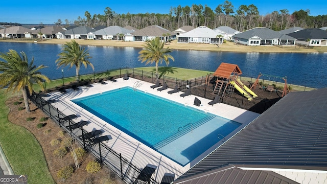 183 Ryan Nicholas Dr, Kingsland, GA 31548 - community pool featuring a residential view and a water view