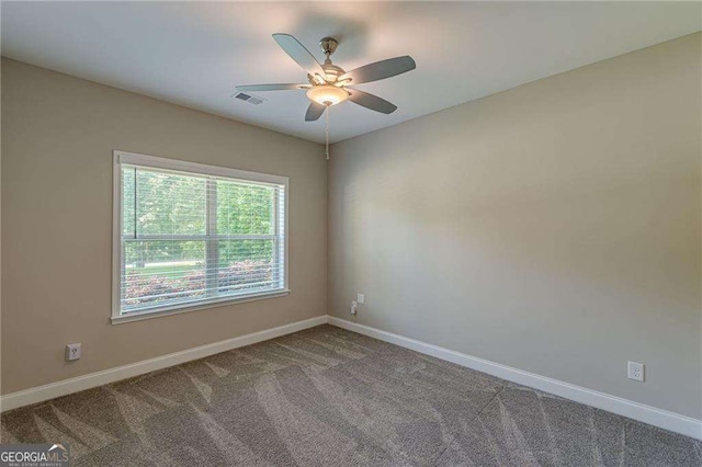 150 Whitworth Dr, Locust Grove, GA 30248 - unfurnished room with carpet and a ceiling fan