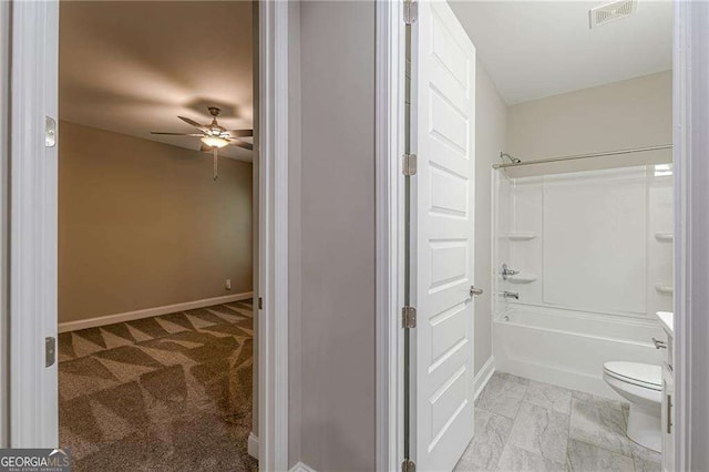 150 Whitworth Dr, Locust Grove, GA 30248 - bathroom with ceiling fan, shower / bathtub combination, and vanity