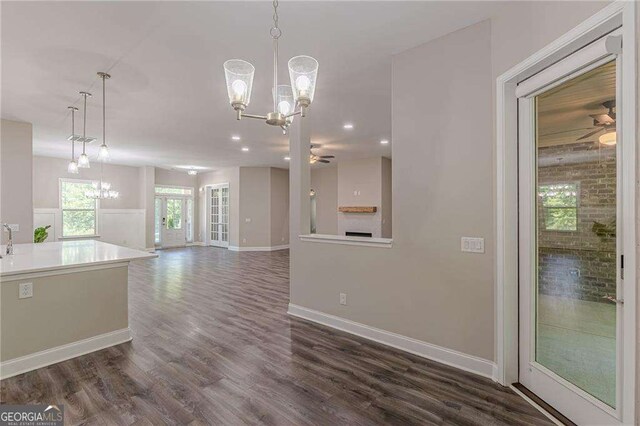 150 Whitworth Dr, Locust Grove, GA 30248 - kitchen featuring a chandelier, a ceiling fan, dark wood-type flooring, pendant lighting, and recessed lighting