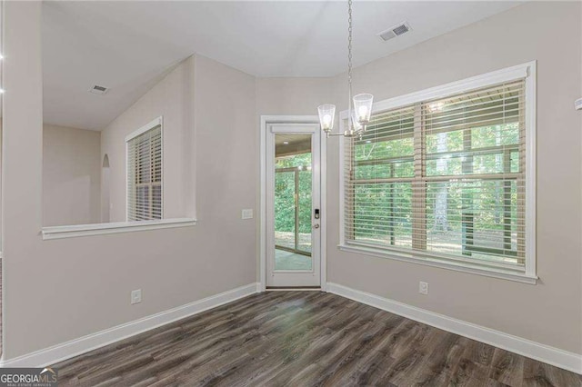 150 Whitworth Dr, Locust Grove, GA 30248 - unfurnished dining area featuring a chandelier and dark wood finished floors