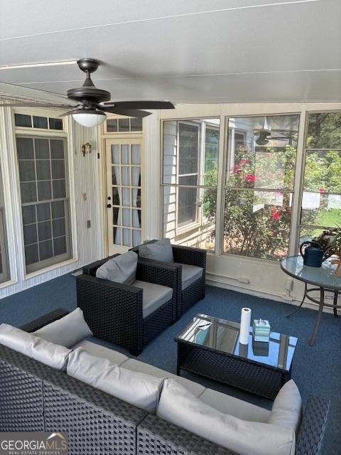 9361 Arbor Glenn Ct, Jonesboro, GA 30263 - sunroom with an outdoor hangout area and ceiling fan