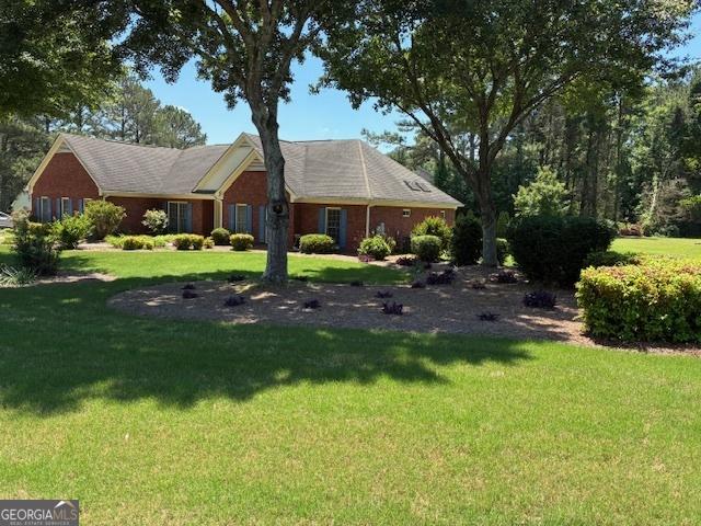 9361 Arbor Glenn Ct, Jonesboro, GA 30263 - ranch-style house featuring a front lawn