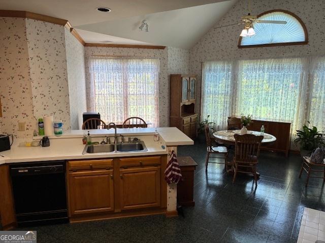 9361 Arbor Glenn Ct, Jonesboro, GA 30263 - kitchen with dishwasher, wallpapered walls, vaulted ceiling, a peninsula, and light countertops