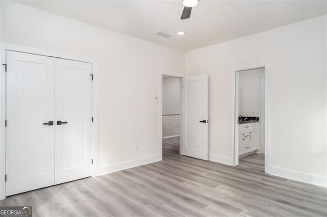 2312 Herring, Atlanta, GA 30311 - unfurnished bedroom featuring light wood-style flooring, a closet, ensuite bathroom, and ceiling fan