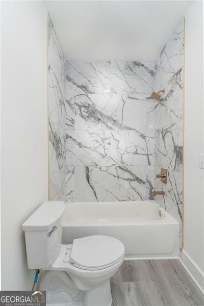 2312 Herring, Atlanta, GA 30311 - bathroom featuring shower / bath combination and wood finished floors