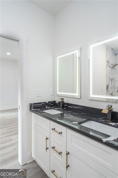 2312 Herring, Atlanta, GA 30311 - full bath with double vanity, wood finished floors, and a marble finish shower