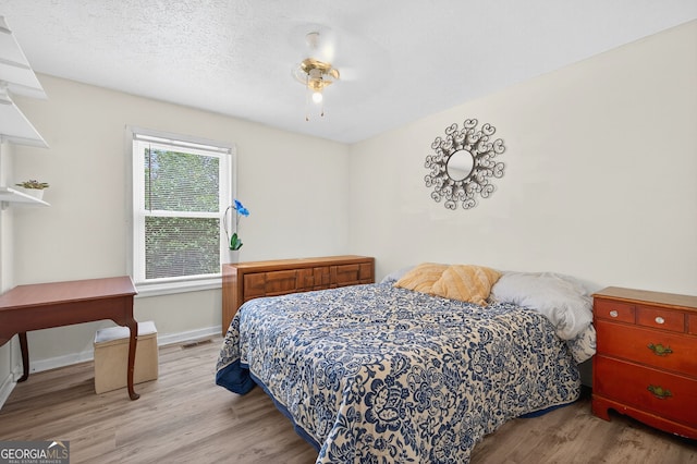 936 Tyrell Dr, Austell, GA 30106 - bedroom with wood finished floors and baseboards