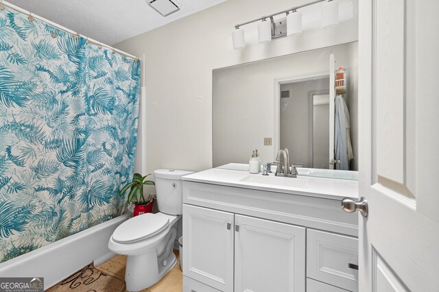 936 Tyrell Dr, Austell, GA 30106 - full bathroom with vanity, shower / tub combo with curtain, and tile patterned floors