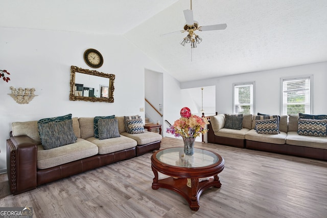 936 Tyrell Dr, Austell, GA 30106 - living area with wood finished floors, vaulted ceiling, and a ceiling fan