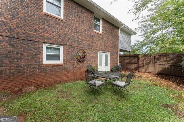 160 Edgewood Dr, Athens, GA 30606 - back of house with brick siding and french doors