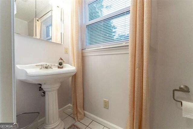 160 Edgewood Dr, Athens, GA 30606 - bathroom with tile patterned flooring and baseboards
