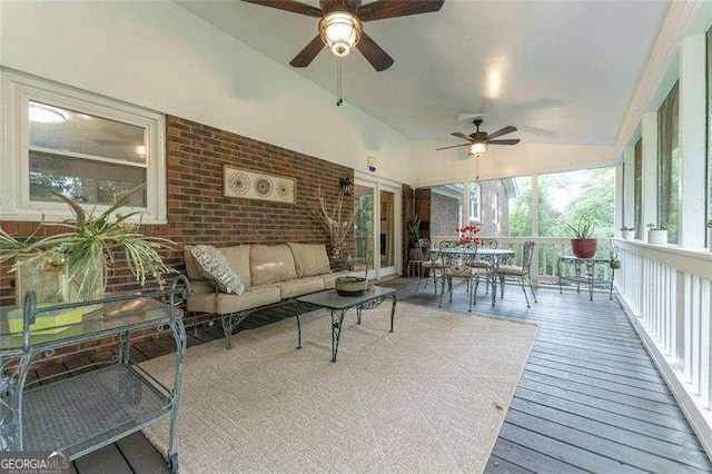 160 Edgewood Dr, Athens, GA 30606 - sunroom / solarium with ceiling fan, hardwood / wood-style flooring, an outdoor living space, outdoor dining space, and vaulted ceiling