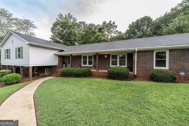 160 Edgewood Dr, Athens, GA 30606 - split level home featuring a front lawn and brick siding