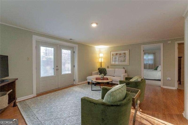 160 Edgewood Dr, Athens, GA 30606 - living area with french doors, ornamental molding, and wood finished floors