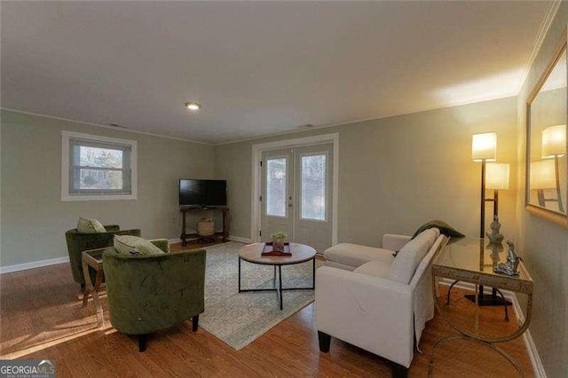 160 Edgewood Dr, Athens, GA 30606 - living room with wood finished floors, ornamental molding, and french doors