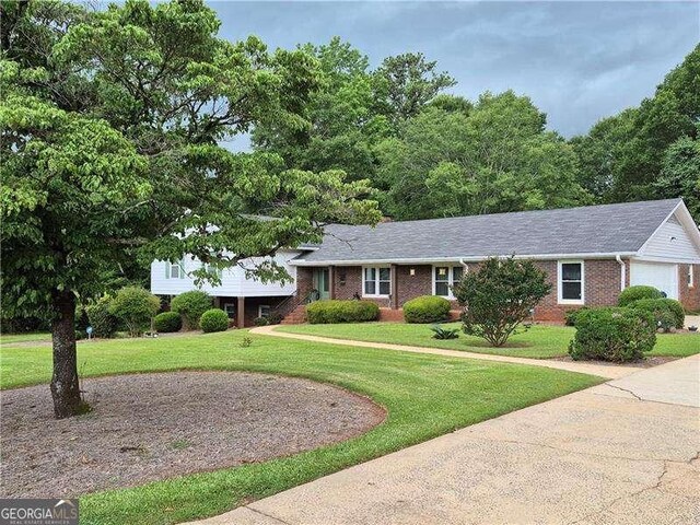 160 Edgewood Dr, Athens, GA 30606 - view of front of house featuring a front lawn and brick siding
