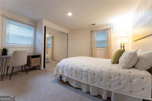 160 Edgewood Dr, Athens, GA 30606 - bedroom featuring carpet, ornamental molding, and a closet