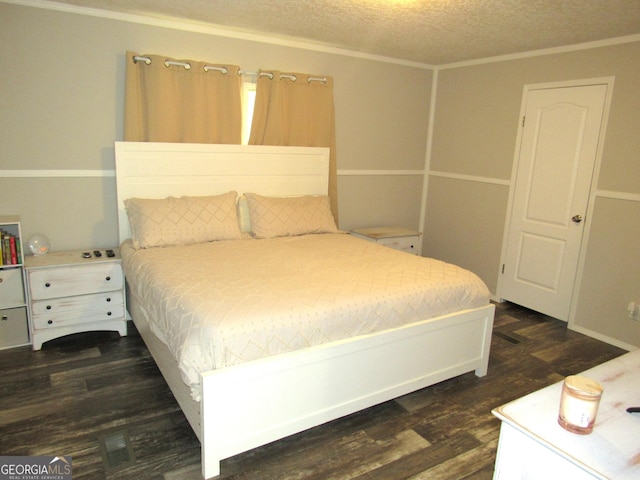 14 Henderson Rd, Cleveland, GA 30528 - bedroom featuring dark wood-style flooring, ornamental molding, and a textured ceiling