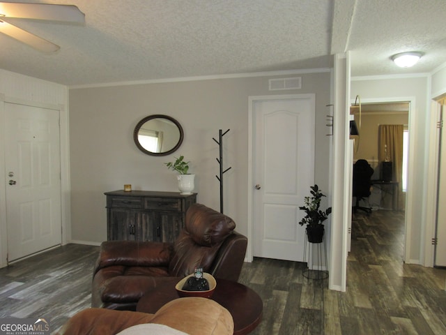 14 Henderson Rd, Cleveland, GA 30528 - living room with a textured ceiling, dark wood-style flooring, crown molding, and ceiling fan