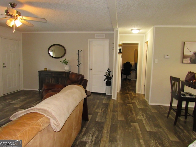 14 Henderson Rd, Cleveland, GA 30528 - living area featuring wood finished floors, ceiling fan, ornamental molding, and a textured ceiling