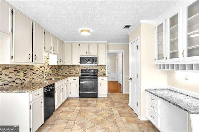 2830 Scottish Mill Way, Marietta, GA 30068 - kitchen featuring black appliances, light stone counters, backsplash, white cabinets, and glass insert cabinets